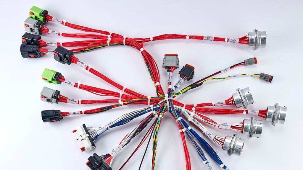 Complex wire harness with 24 multi pin connectors used in an overhead crane